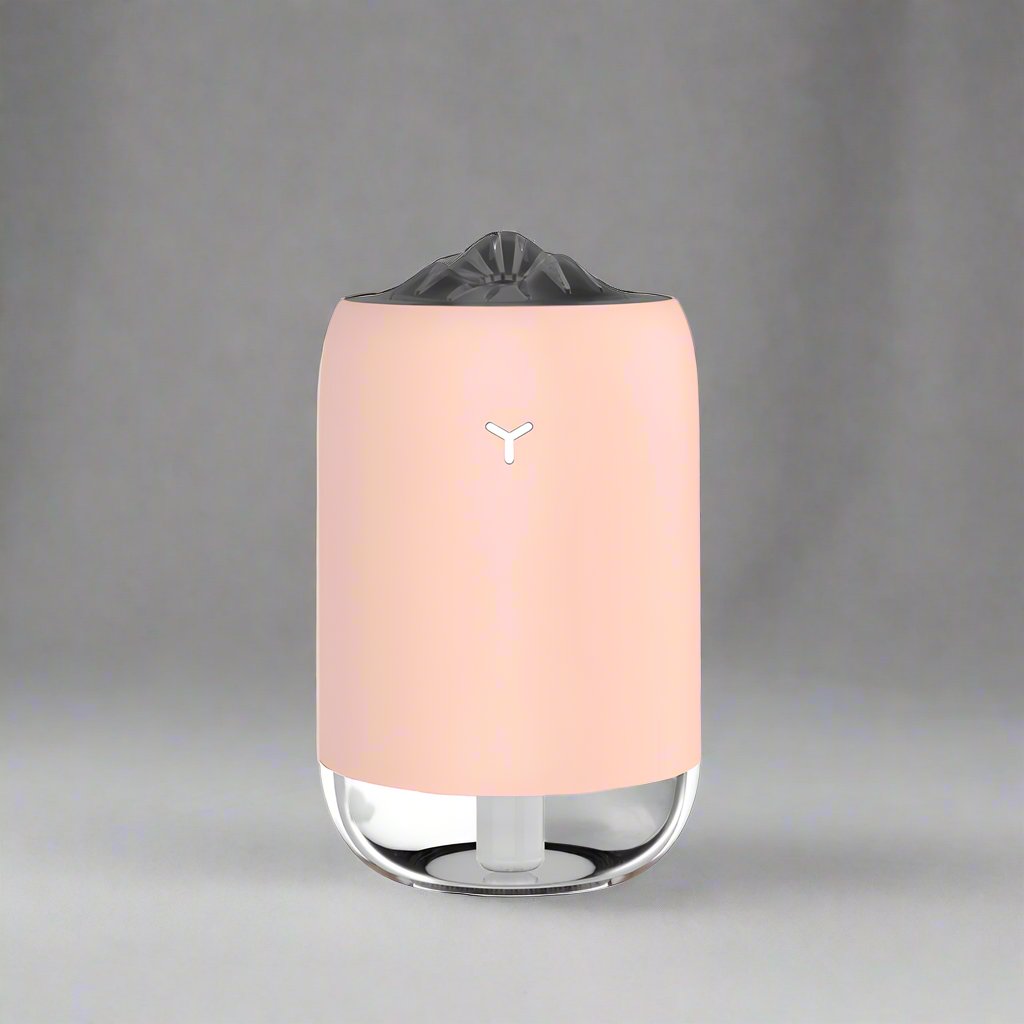 Pink Magic Flame Aroma Diffuser Humidifier with a sleek design and LED lighting feature, suitable for desktop and car use. Ideal for home, office, and travel settings.