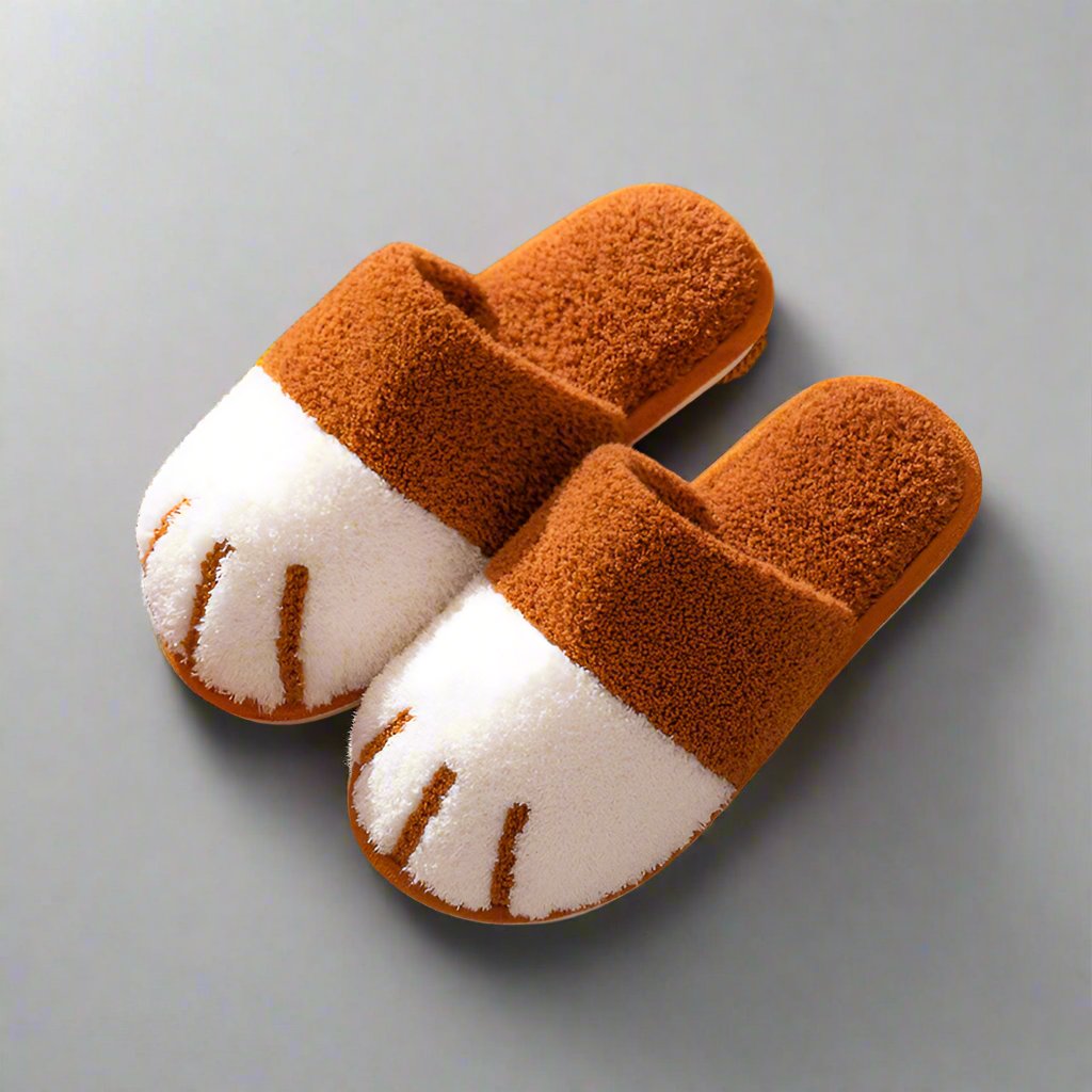 Caramel and white fluffy paw-shaped slippers for autumn and winter, designed for women. Cozy indoor floor shoes ideal for bedrooms, featuring a kawaii style. Suitable for couples, these warm flat footwear slides add comfort and style to any home setting."